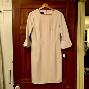 Pretty winter white Donna Morgan dress. Size 8 never worn. Nordstrom Rack tag.